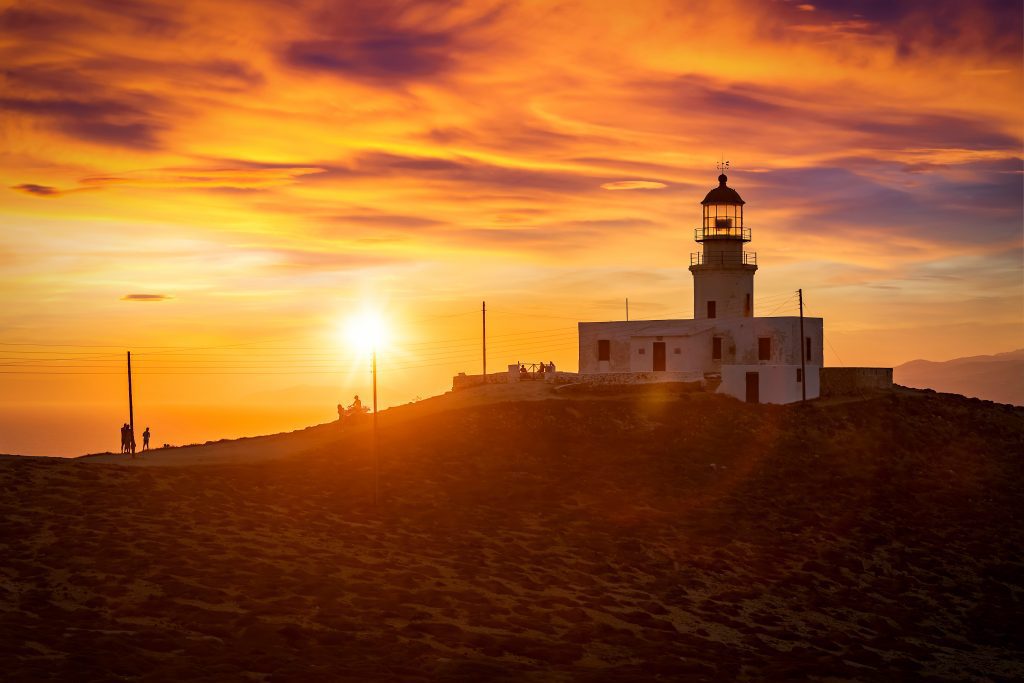 mykonos lighthouse sunset